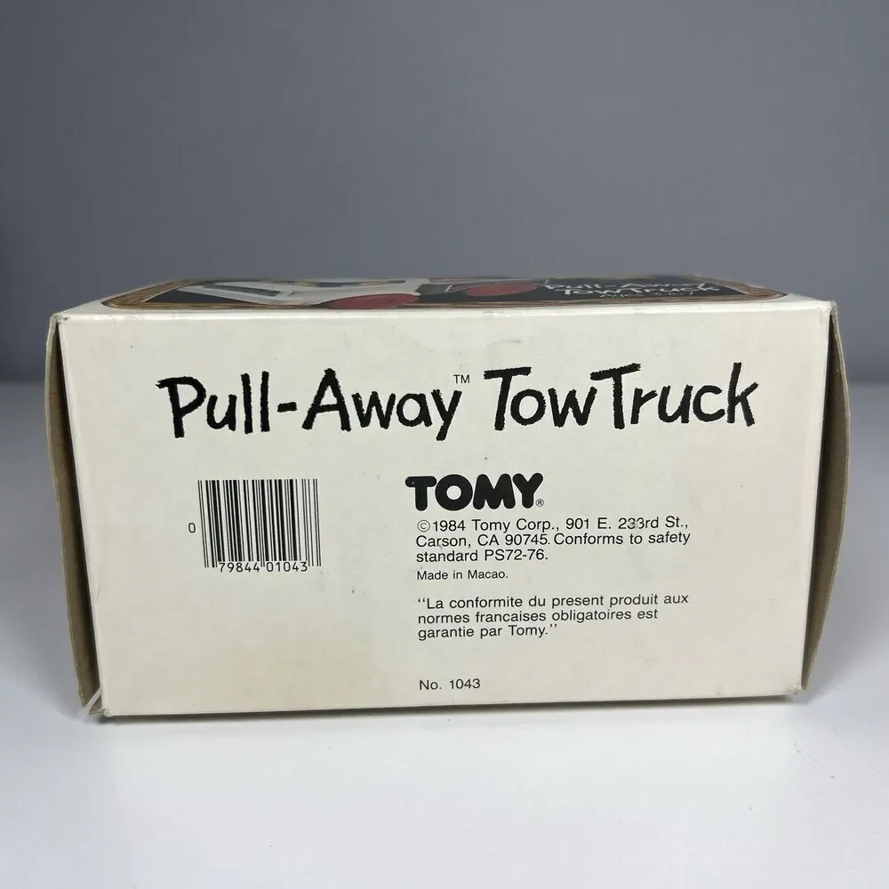 Tomy Pull-Away Toy Tow Truck Vintage 1984 No. 1043 Complete With Box & Booklet